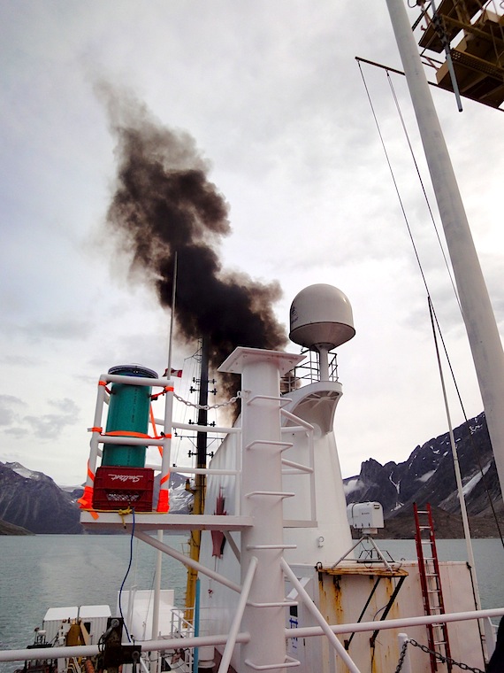 Black exhaust from HFO floats up into the air from an icebreaker off the coast of Baffin Island. The exhaust, filled with black particles, contributes to warming on the land while its pollutants also affect human health. (FILE PHOTO)