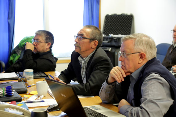 The Arctic Fishery Alliance, which comprises Arctic Bay, Grise Fiord, Resolute Bay and Qikiqtarjuaq, talk Feb. 20 during a meeting in Arctic Bay. From left to right: AFA chief executive officer Lootie Toomasie of Qikiqtarjuaq, AFA chair Jaypetee Akeeagok of Grise Fiord and AFA manager Harry Earle of St. John’s. Fisheries Alliance members have decided to hire community liaison officers in their communities to work on local development projects. They also decided to launch an Aboriginal studies scholarship with Carleton University that each year will go to one student from each of their four communities. Read Nunatsiaqonline.ca later for more on the AFA. (PHOTO COURTESY OF MARK AKEEAGOK, AFA)