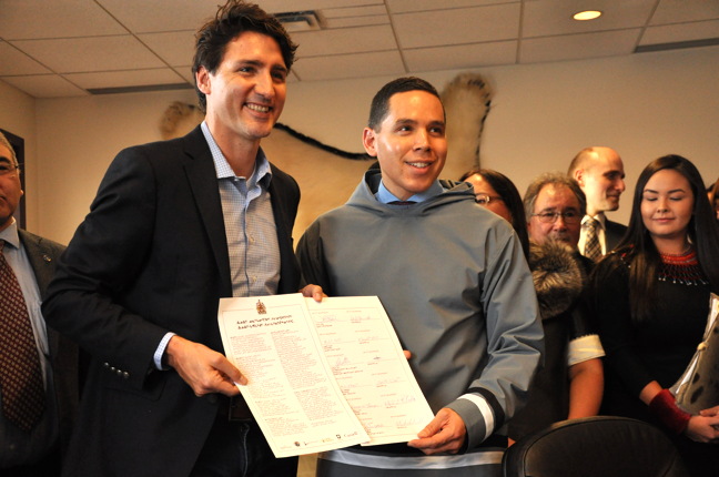 Prime Minister Justin Trudeau and Inuit Tapiriit Kanatami President Natan Obed signing the Inuit-Crown partnership agreement in Iqaluit Feb. 9. (FILE PHOTO)