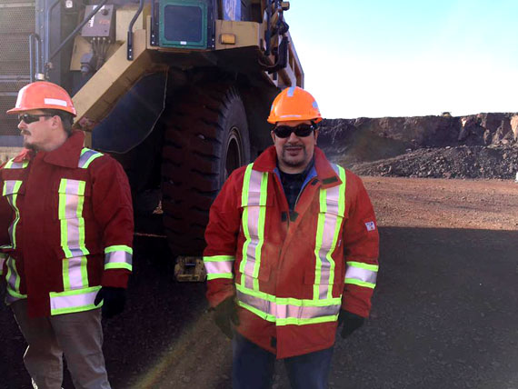 QIA's Arctic Bay community director Levi Barnabas (right) and QIA President PJ Akeeagok (left) on a site visit to the Mary River iron mine at the end of April. (PHOTO COURTESY OF QIA)