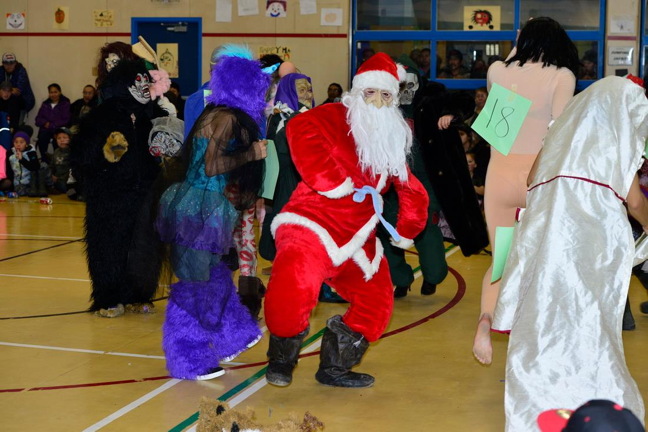 Santa Claus kicks up his heels at an annual Halloween party and costume contest at Attagoyuk School in Pangnirtung. By the looks of photos of the event posted to social media, it appears the south Baffin community has more than its share of creative costume-makers. (PHOTO BY DAVID KILABUK)
