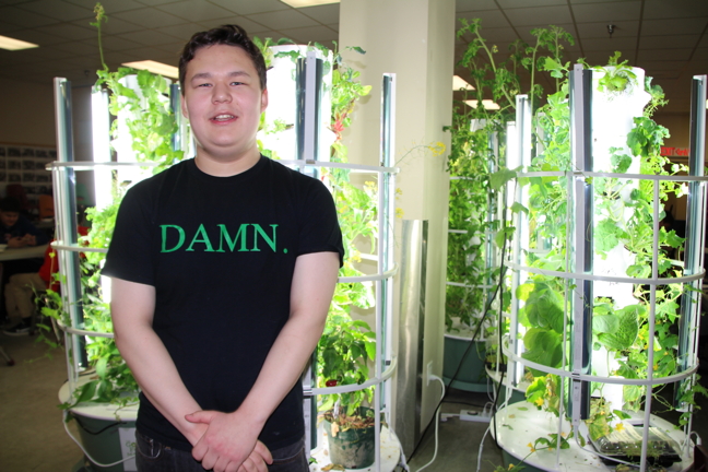 Jeremy Young is one of six Iqaluit youth who have new part-time jobs running the free-lunch program and hydroponic tower gardens at Inuksuk High School. Young said his job of choice will be washing dishes.