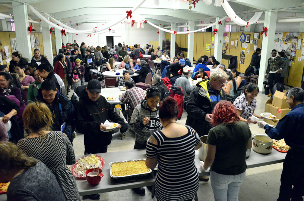 About 200 Inuit living in Ottawa enjoyed Tunngasuvvingat Inuit's monthly feast, held yesterday at Our Lady of Assumption Church in Vanier. A report launched at the event finds that the health status of Inuit living in the city is generally no better than that of Inuit living in northern Canada. (PHOTO BY JIM BELL)