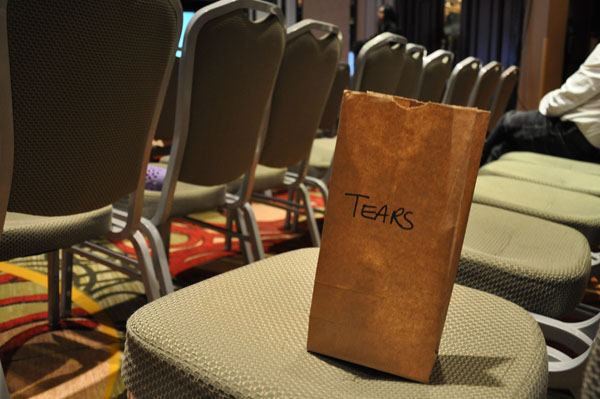 A bag of tears sits on a chair at the national inquiry's March hearings in Montreal March 14. The bag is set up at hearings for people to discard used tissue; the bags are burned at the end of each hearing day to cleanse the room of pain and trauma. (PHOTO BY SARAH ROGERS)