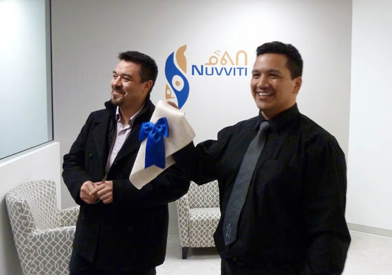 Makivik Corp. treasurer Andy Pirti, left, with Nuvviti Development Corp. chair Tommy Palliser at the opening of the corporation's new Montreal office March 14. (PHOTO COURTESY OF MAKIVIK CORP)