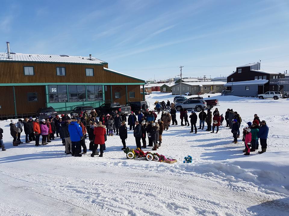 People in Kugluktuk are joined by family members and co-workers of an RCMP officer who died April 7 in an off-duty snowmobile mishap outside the western Nunavut community of Kugluktuk. (PHOTO COURTESY OF THE RCMP)
