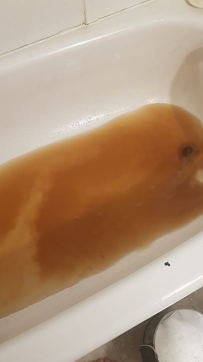 A resident of Rankin Inlet posted this image to social media last week of their bathtub filled with brown tap water. 
