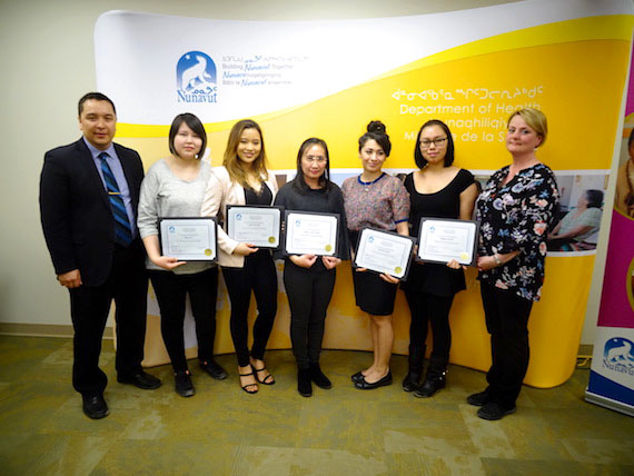 Top nursing students in years two to four at Nunavut Arctic College’s nursing program receive Queen Elizabeth Scholarship Awards worth $3,000 at a Friday afternoon ceremony in Iqaluit. Nunavut Health Minister Pat Angnakak, Education Minister David Joanasie and the Health Department's deputy minister, Colleen Stockley, praised the academic success of the award recipients who achieved the highest grade point averages in their respective years. Angnakak said she looks forward to welcoming more Nunavut nurses. From left: Joanasie, Mavis Ell, Amiel Hernandez, Maria Fellen Atienza, Samantha Cooper, Maybelle Enuaraq, and Angnakak. Not present: Oopik Aglukark. (PHOTO BY JANE GEORGE)

