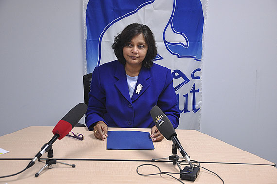 Padma Suramala, Nunavut's former chief coroner, is suing the Government of Nunavut for wrongful dismissal. She is seen here at an October 2014 news conference held at her Iqaluit office. (FILE PHOTO