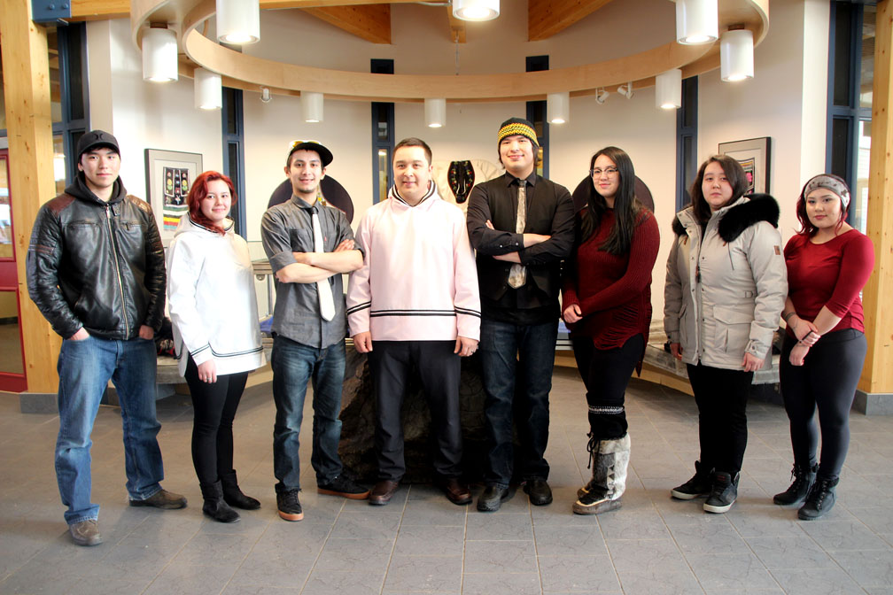 The seven young Nunavut artists who won the third annual Qilaut song contest  in 2017 stand at the legislature in Iqaluit last March with David Joanasie, the minister of culture and heritage.