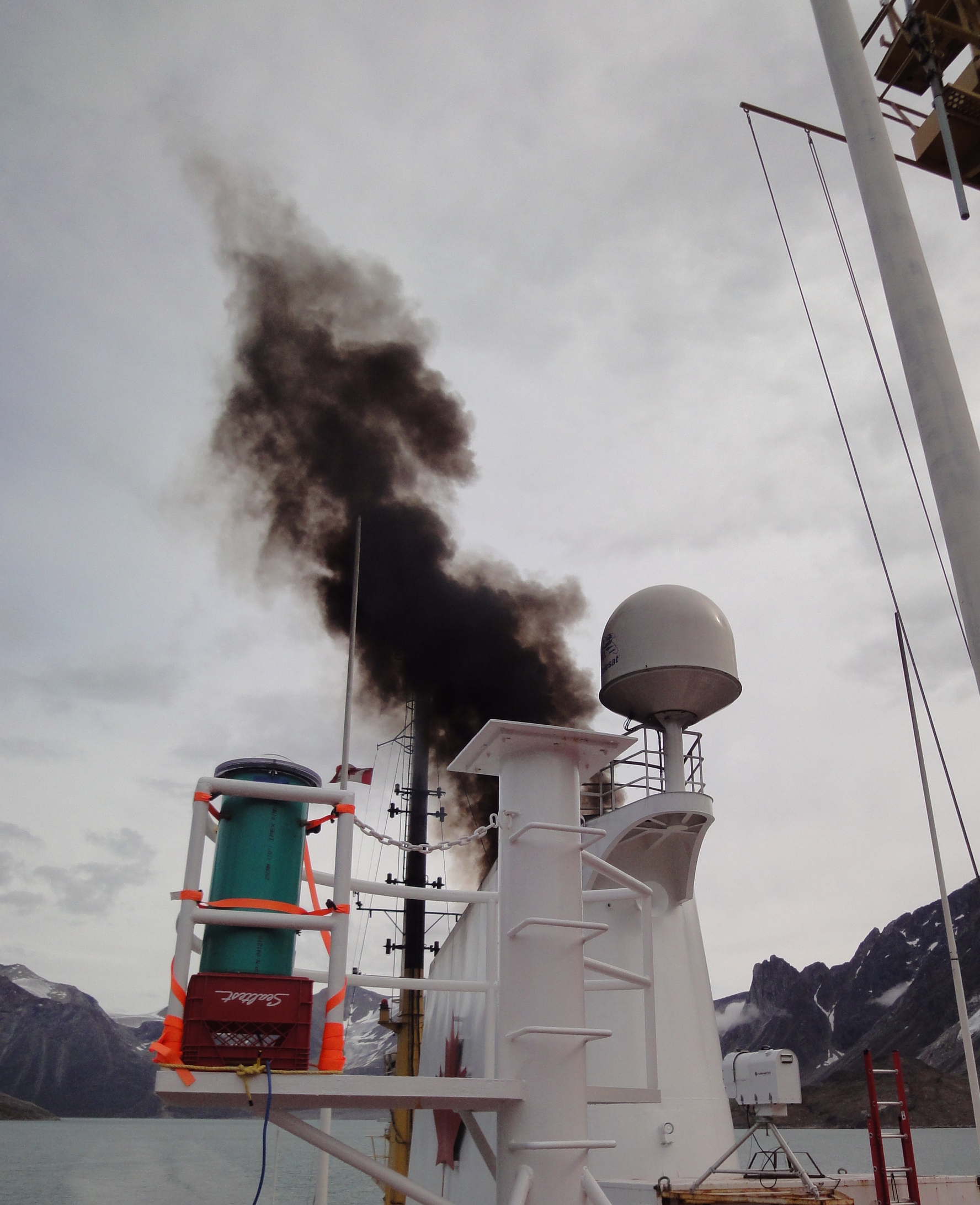 Dirty-burning heavy fuel oil produces ship exhaust like this black plume, which then deposits heat-absorbing particles. The sludgy fuel would be damaging if spilled in the Arctic. (FILE PHOTO)