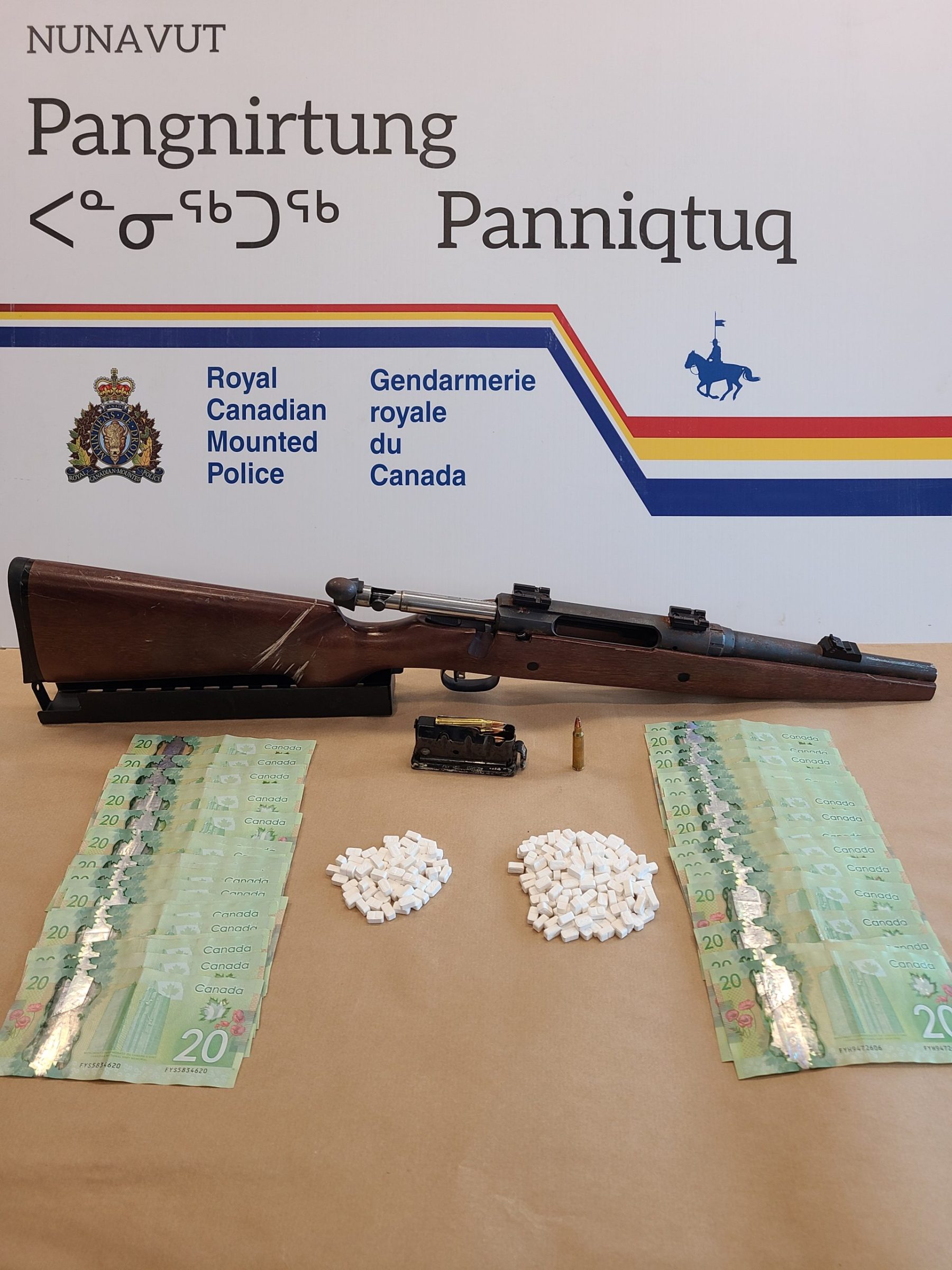 During a search in Pangnirtung last week police officers officers seized 100 grams of methamphetamine, a shotgun and money, according to an RCMP news release. (Photo courtesy of RCMP)
